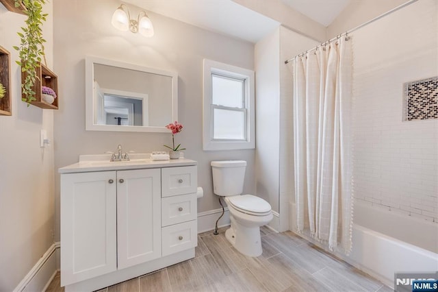 20 Brighton Ave, Bloomfield, NJ 07003 - full bath with vanity, shower / bathtub combination with curtain, and wood tiled floors