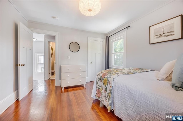20 Brighton Ave, Bloomfield, NJ 07003 - bedroom featuring wood finished floors and ornamental molding