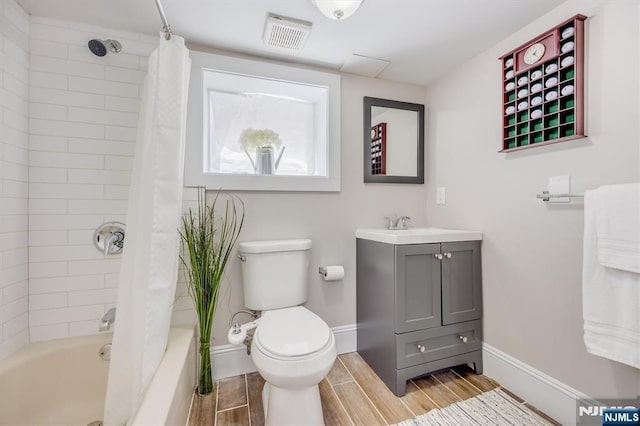 20 Brighton Ave, Bloomfield, NJ 07003 - bathroom featuring vanity, shower / bath combination with curtain, and wood finished floors