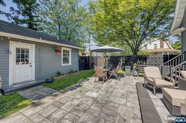 20 Brighton Ave, Bloomfield, NJ 07003 - fenced backyard with a patio area and outdoor dining space