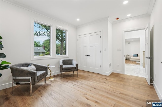 492 Oaktree Rd, Oradell, NJ 07649 - living area with light wood finished floors, ornamental molding, and recessed lighting