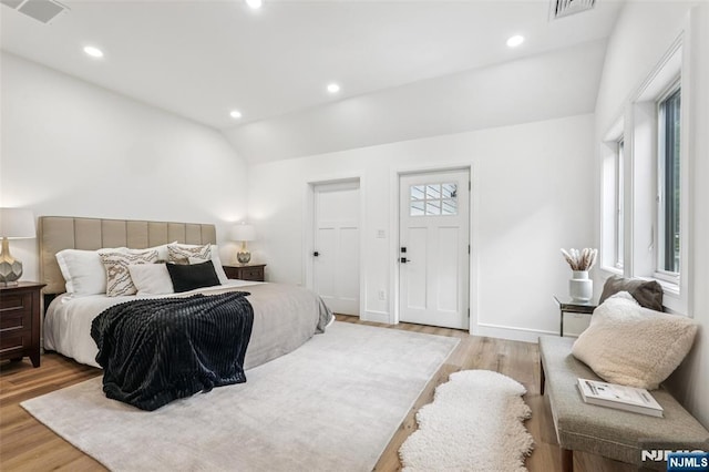 492 Oaktree Rd, Oradell, NJ 07649 - bedroom featuring light wood finished floors, lofted ceiling, and recessed lighting