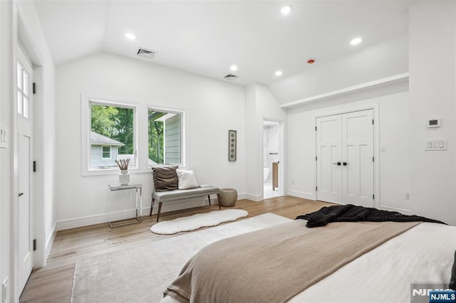 492 Oaktree Rd, Oradell, NJ 07649 - bedroom with vaulted ceiling, light wood-type flooring, recessed lighting, and a closet