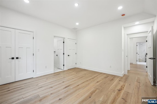 492 Oaktree Rd, Oradell, NJ 07649 - unfurnished bedroom featuring light wood-style floors, recessed lighting, and ensuite bathroom