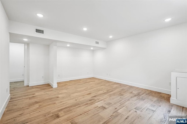 492 Oaktree Rd, Oradell, NJ 07649 - finished basement with light wood finished floors and recessed lighting