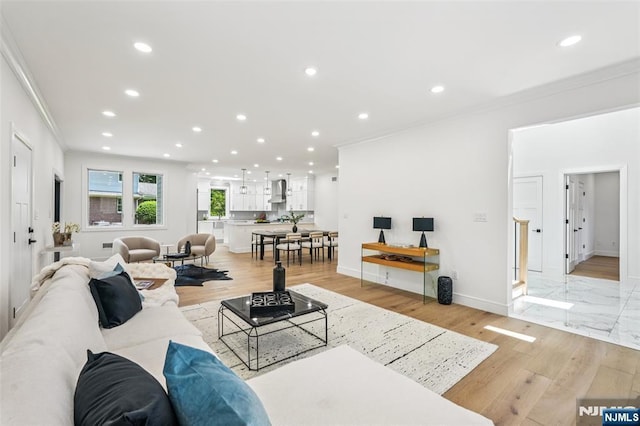 492 Oaktree Rd, Oradell, NJ 07649 - living area with ornamental molding, recessed lighting, and light wood-style floors