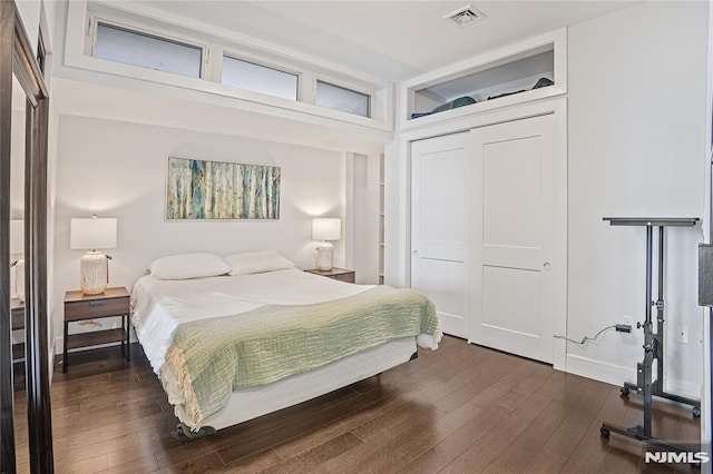 6401 Park Ave Unit 401, West New York, NJ 07093 - bedroom with dark wood-style floors and a closet