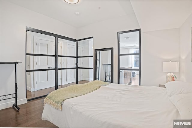 6401 Park Ave Unit 401, West New York, NJ 07093 - bedroom with wood finished floors and baseboards