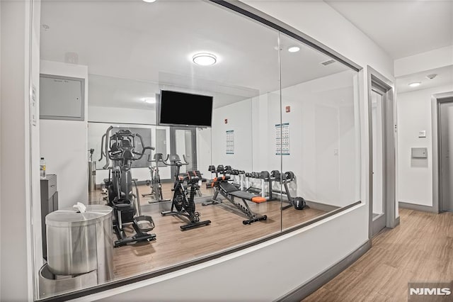 6401 Park Ave Unit 401, West New York, NJ 07093 - exercise area with wood finished floors and recessed lighting