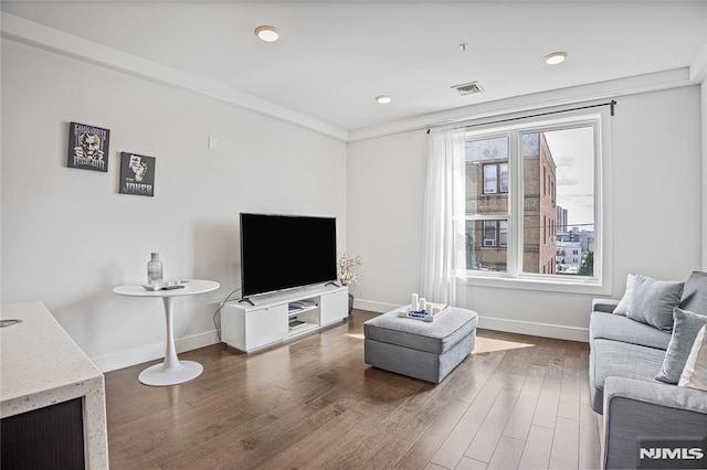 6401 Park Ave Unit 401, West New York, NJ 07093 - living area with wood finished floors, recessed lighting, and crown molding