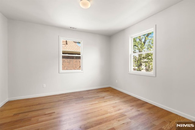 195 Stanley Pl, Hackensack, NJ 07601 - spare room featuring light wood-style floors and baseboards