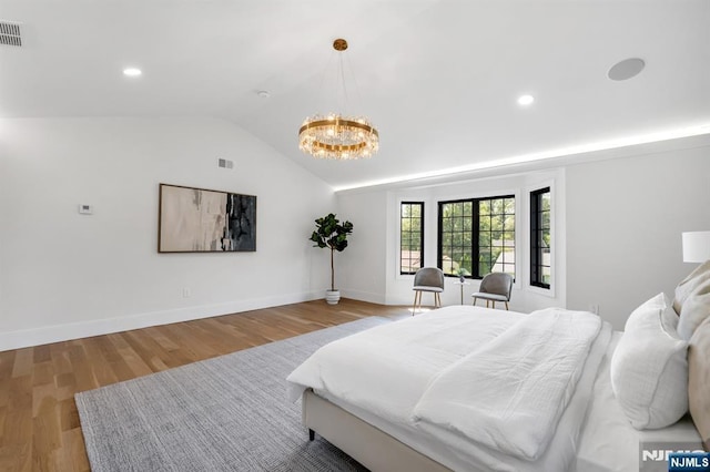 452 Oregon St, Paramus, NJ 07652 - bedroom featuring a chandelier, lofted ceiling, light wood-type flooring, and recessed lighting