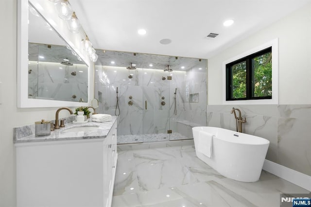 452 Oregon St, Paramus, NJ 07652 - bathroom with a marble finish shower, a soaking tub, double vanity, tile walls, and marble tiled floors