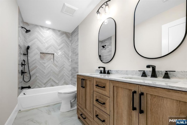 452 Oregon St, Paramus, NJ 07652 - bathroom featuring double vanity, shower / bathtub combination, marble look tile flooring, and recessed lighting
