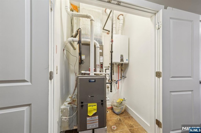 110-114Br Broad, Newark, NJ 07104 - utility room featuring water heater