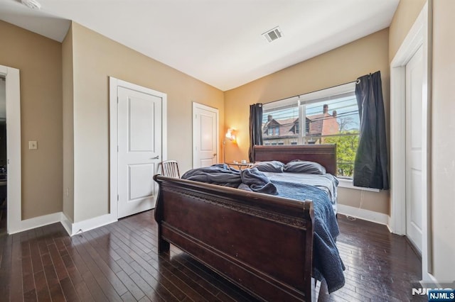 110-114Br Broad, Newark, NJ 07104 - bedroom featuring baseboards and dark wood-type flooring