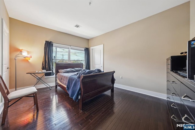 110-114Br Broad, Newark, NJ 07104 - bedroom featuring baseboards and dark wood-style flooring