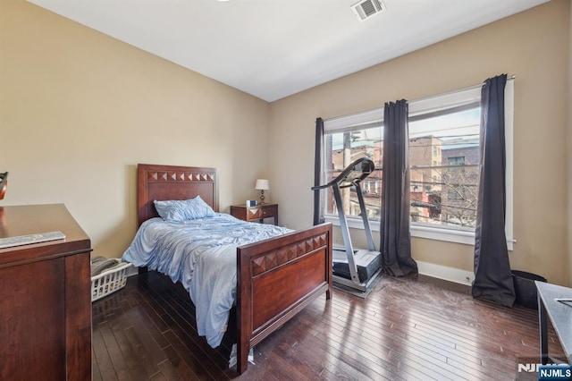 110-114Br Broad, Newark, NJ 07104 - bedroom featuring dark wood finished floors and baseboards