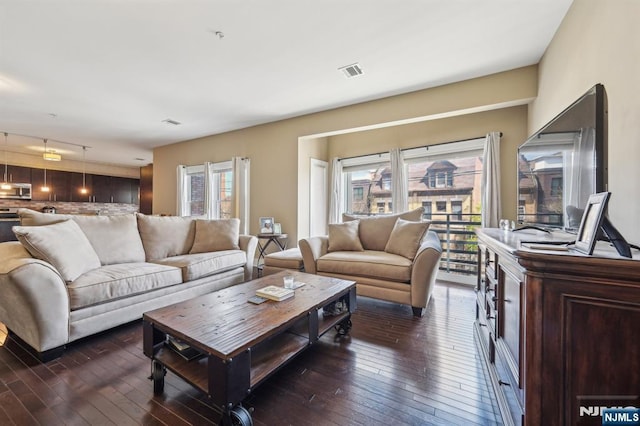 110-114Br Broad, Newark, NJ 07104 - living area with dark wood-style flooring