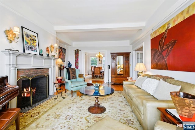 375 Mount Prospect Unit 6B, Newark, NJ 07104 - living area featuring a brick fireplace, wood finished floors, beamed ceiling, and a chandelier