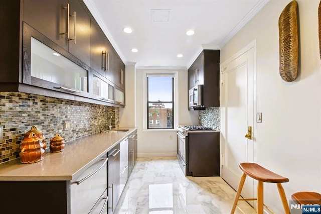 375 Mount Prospect Unit 6B, Newark, NJ 07104 - kitchen featuring stainless steel appliances, light marble finish flooring, backsplash, recessed lighting, and crown molding