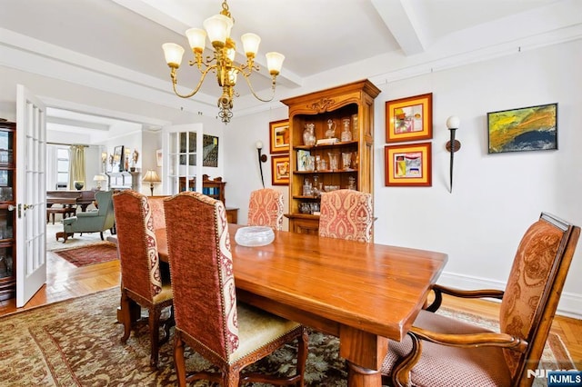 375 Mount Prospect Unit 6B, Newark, NJ 07104 - dining area featuring a chandelier, wood finished floors, and beam ceiling