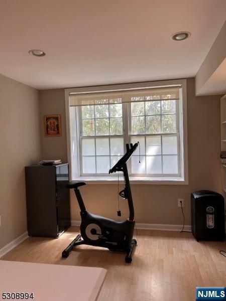 140 Levinberg Ln, Wayne, NJ 07470 - exercise area with healthy amount of natural light, light wood-style flooring, and recessed lighting