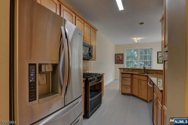 140 Levinberg Ln, Wayne, NJ 07470 - kitchen featuring stainless steel appliances and a peninsula