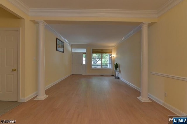 140 Levinberg Ln, Wayne, NJ 07470 - empty room featuring wood finished floors, ornate columns, and ornamental molding