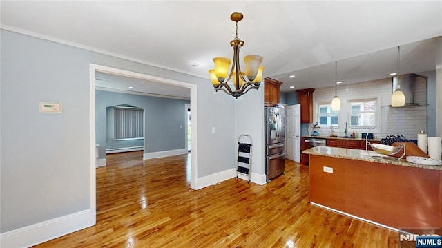 39 Boyden Pkwy, Maplewood, NJ 07040 - kitchen with appliances with stainless steel finishes, a chandelier, light wood-style flooring, pendant lighting, and ornamental molding