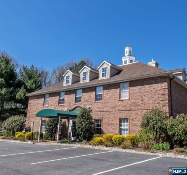 7206 Richmond Rd Unit 7206, West Milford, NJ 07480 - view of property featuring uncovered parking