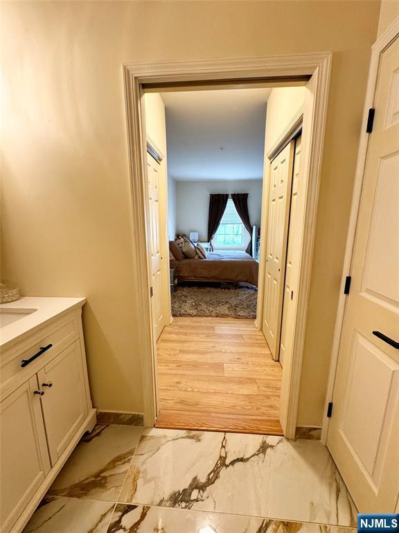 7206 Richmond Rd Unit 7206, West Milford, NJ 07480 - bathroom with marble finish flooring, vanity, and ensuite bath