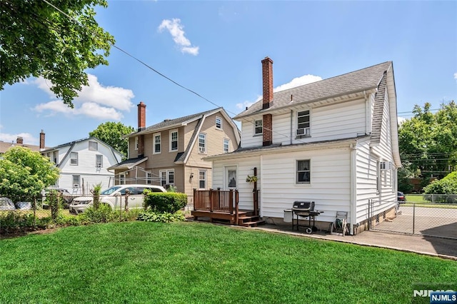 1 Whittlesey Ave, West Orange, NJ 07052 - rear view of house featuring a chimney, a patio area, and a deck
