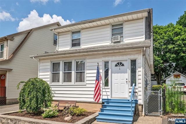 1 Whittlesey Ave, West Orange, NJ 07052 - view of front of home featuring entry steps, cooling unit, and a gate