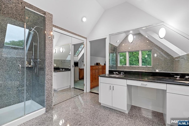 747 Mildred St, Teaneck, NJ 07666 - bathroom featuring lofted ceiling, vanity, a stall shower, recessed lighting, and granite floors
