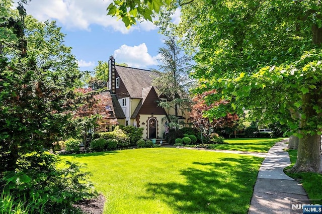 747 Mildred St, Teaneck, NJ 07666 - view of front of home featuring a front lawn and stucco siding