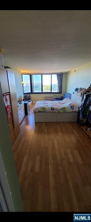 1265 15th Unit 11L, Fort Lee, NJ 07024 - bedroom with wood finished floors