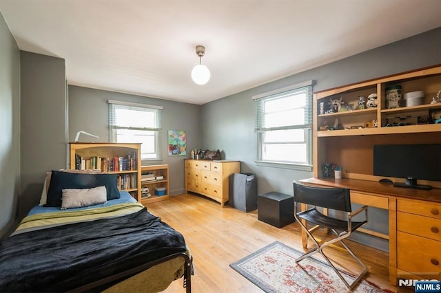 279 Jefferson Ave, Cresskill, NJ 07626 - bedroom with light wood-style floors and a desk