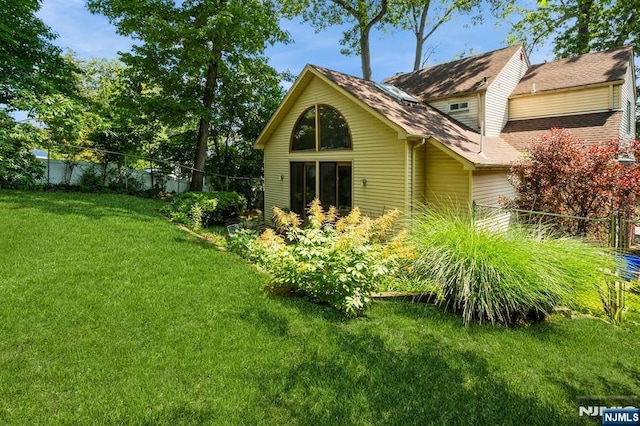 279 Jefferson Ave, Cresskill, NJ 07626 - back of house featuring roof with shingles
