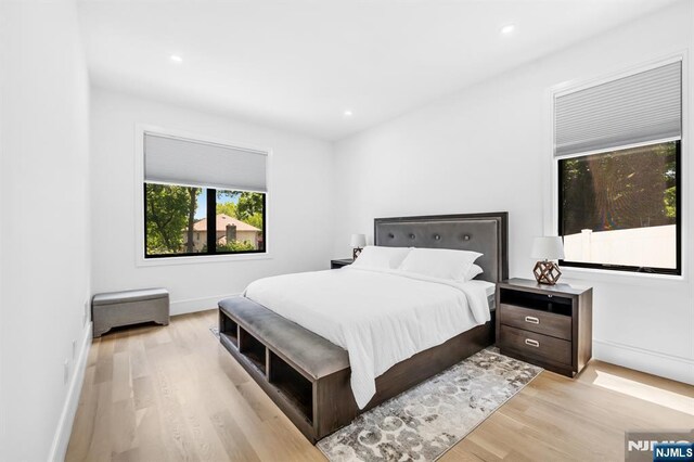 404 Willard Rd, Paramus, NJ 07652 - bedroom featuring light wood-type flooring and recessed lighting