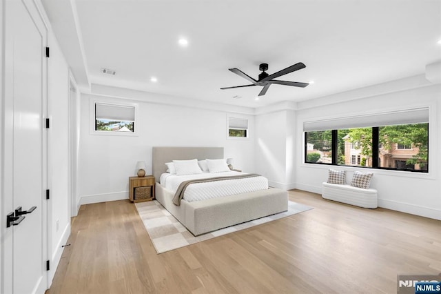 404 Willard Rd, Paramus, NJ 07652 - bedroom with light wood finished floors, recessed lighting, and a ceiling fan