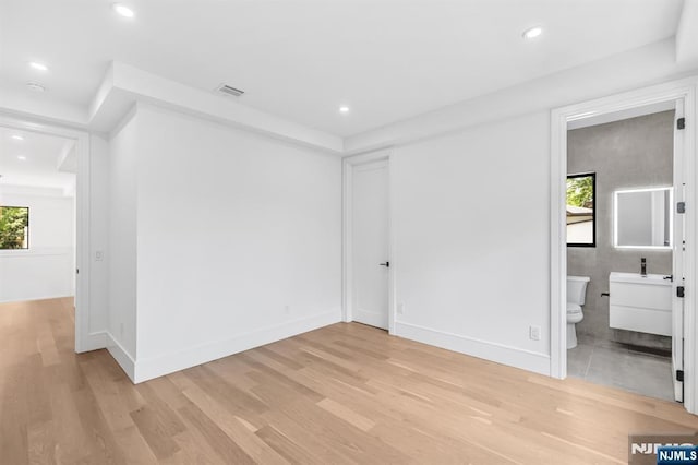 404 Willard Rd, Paramus, NJ 07652 - empty room with light wood-style flooring and recessed lighting