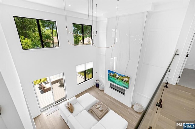 404 Willard Rd, Paramus, NJ 07652 - living room featuring light wood-style floors