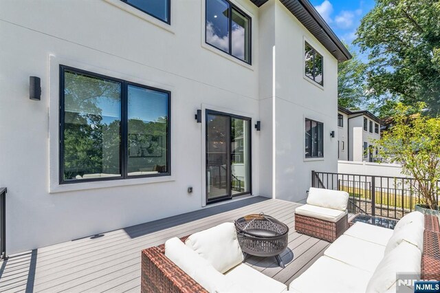 404 Willard Rd, Paramus, NJ 07652 - wooden deck featuring an outdoor living space
