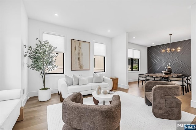 404 Willard Rd, Paramus, NJ 07652 - living area with a chandelier, light wood-style floors, and recessed lighting