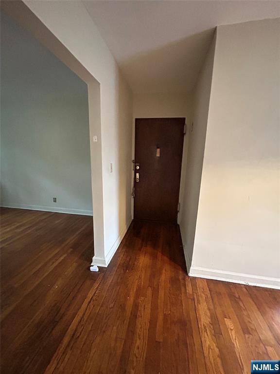 22 Cedar St Unit 2B, Ridgefield Park, NJ 07660 - hallway with hardwood / wood-style floors and baseboards