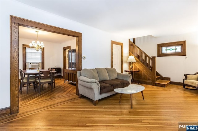 39 Lexington Ave, Bloomfield, NJ 07003 - living area featuring plenty of natural light, a chandelier, cooling unit, and stairs