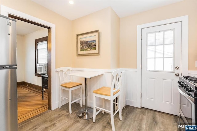 39 Lexington Ave, Bloomfield, NJ 07003 - dining space featuring wood finished floors and a wainscoted wall