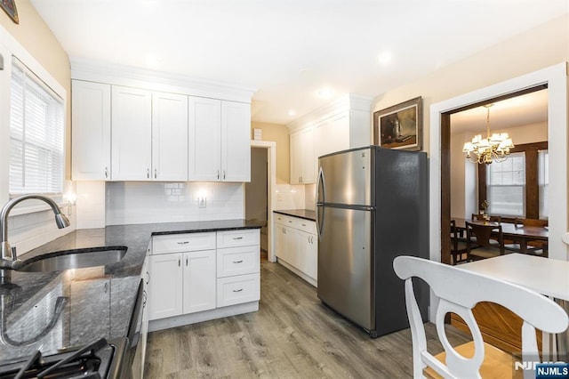 39 Lexington Ave, Bloomfield, NJ 07003 - kitchen featuring stainless steel appliances, healthy amount of natural light, white cabinetry, backsplash, and recessed lighting