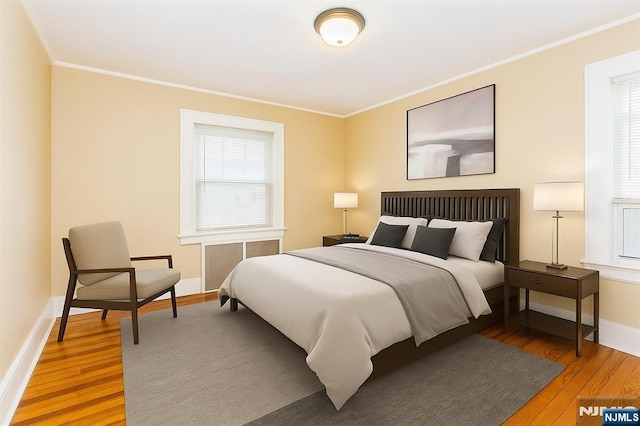 39 Lexington Ave, Bloomfield, NJ 07003 - bedroom with wood finished floors and crown molding